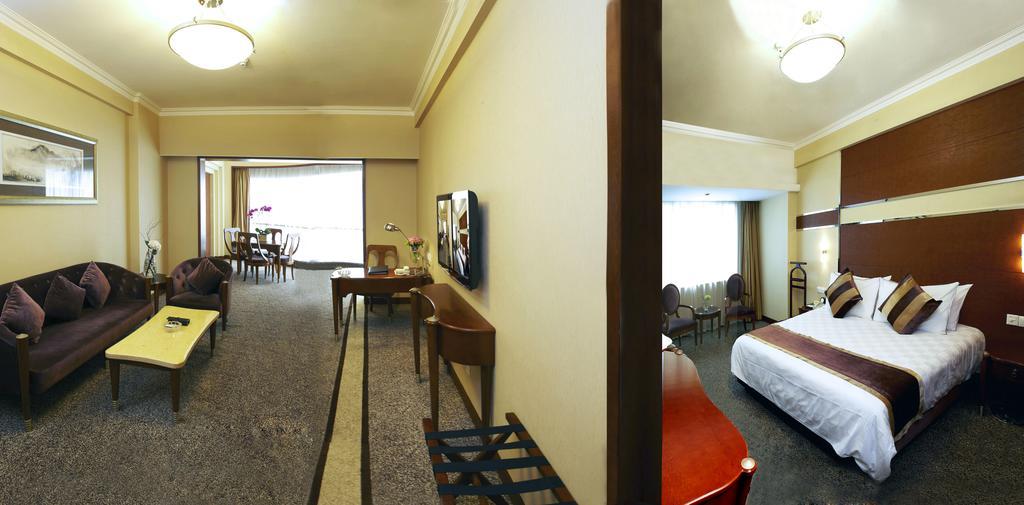 Dynasty Hotel Уенжоу Стая снимка