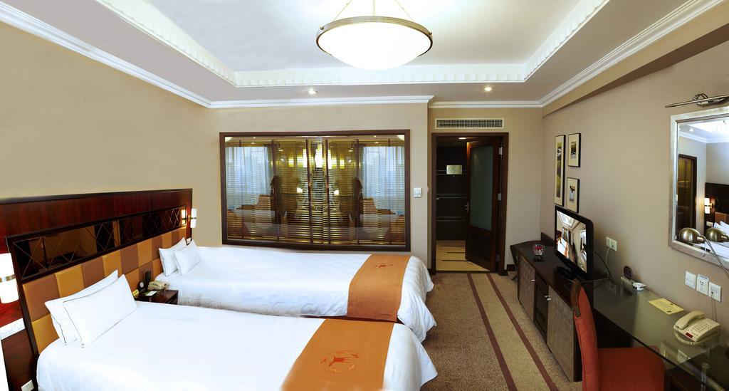 Dynasty Hotel Уенжоу Стая снимка