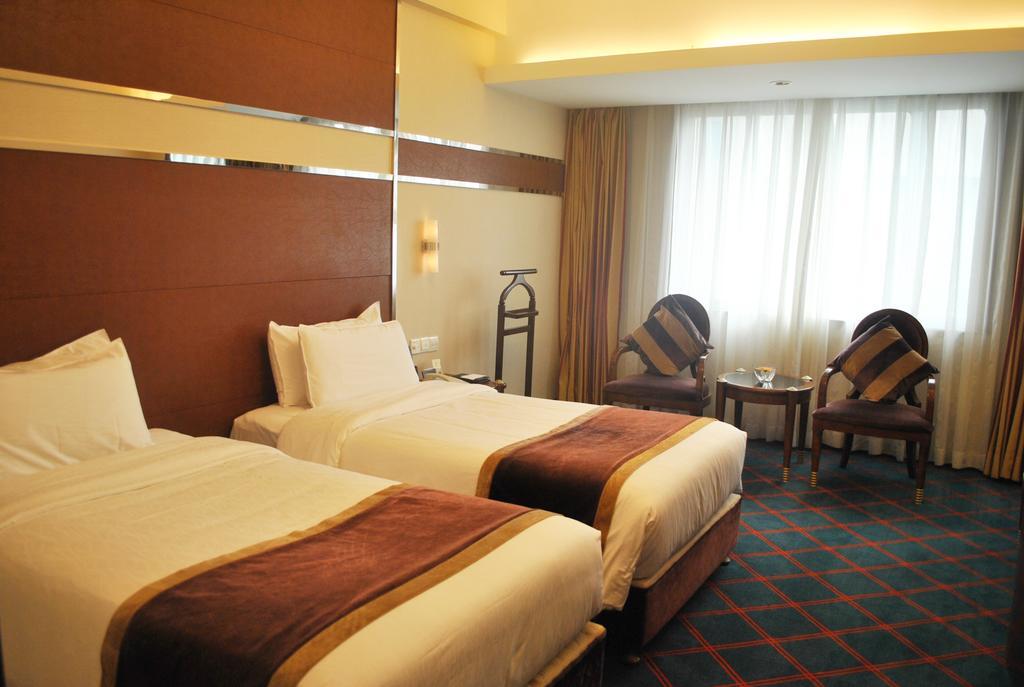 Dynasty Hotel Уенжоу Стая снимка